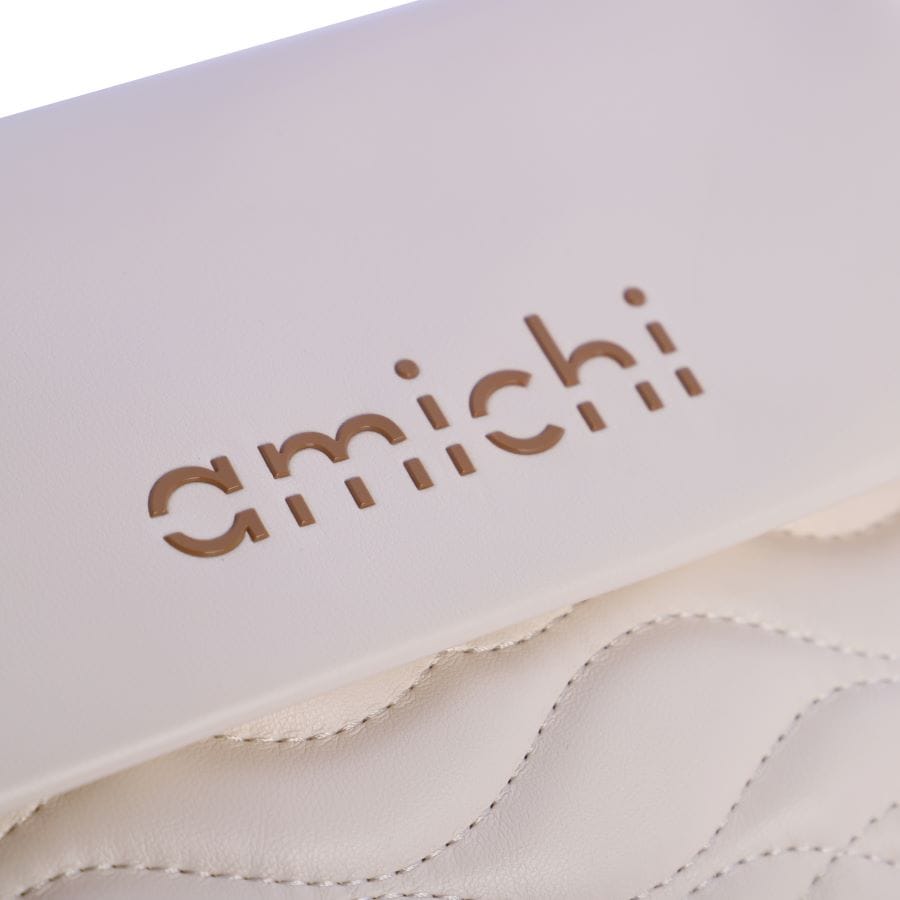 Detalle del bolso bandolera bicolor Amichi en piel sintética