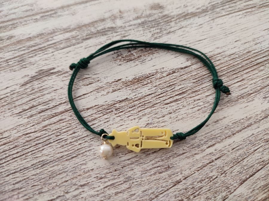 Pulsera amarilla con cordón verde de san Roque