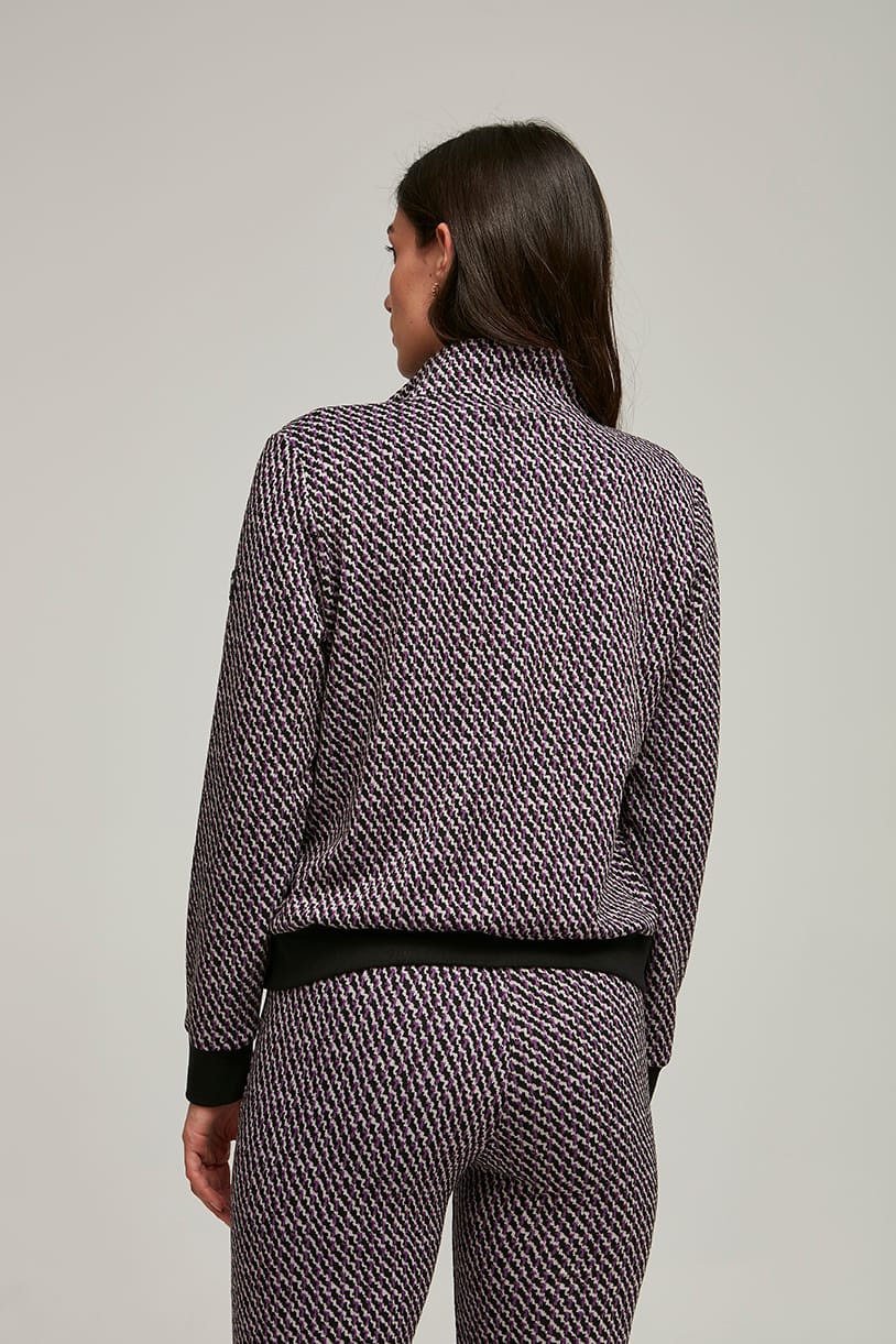 Chaqueta jaspeada en varios tonos con cremallera y puño