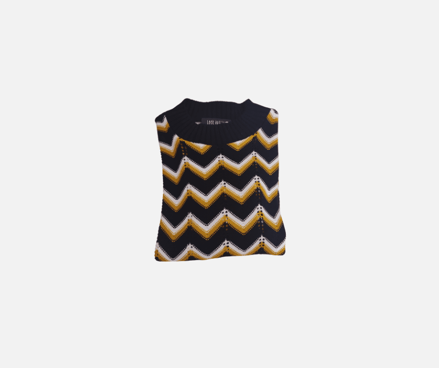 Jersey zig zag en negro mostaza y blanco