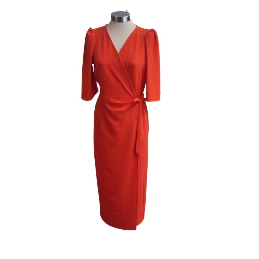 Vestido naranja de Flores muñoz, elegante y versátil